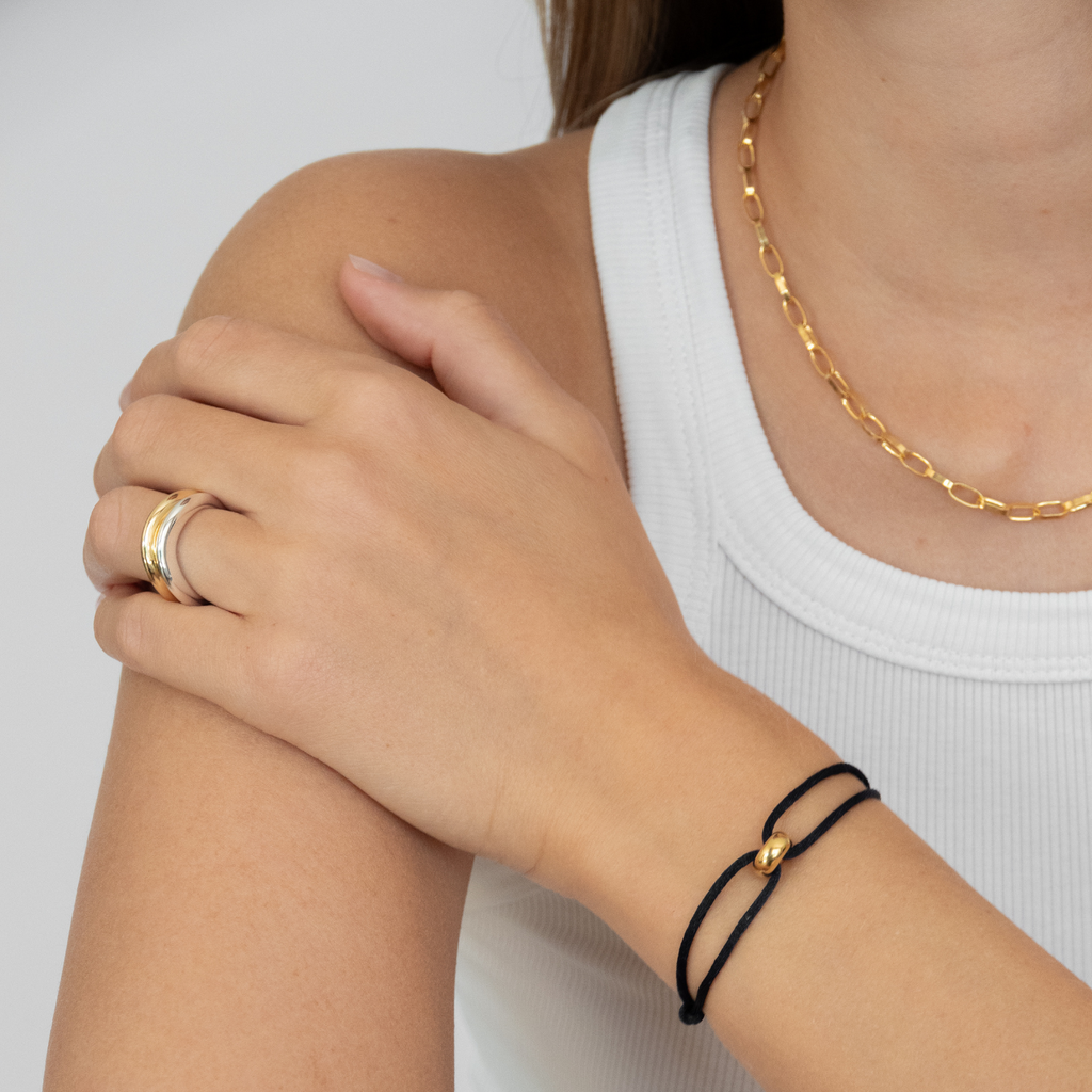 This bracelet is made of silk ribbon, recycled silver and plated with 18k thick gold. A high-quality and strong alloy is particularly important to us for all of our gold-plated products. 