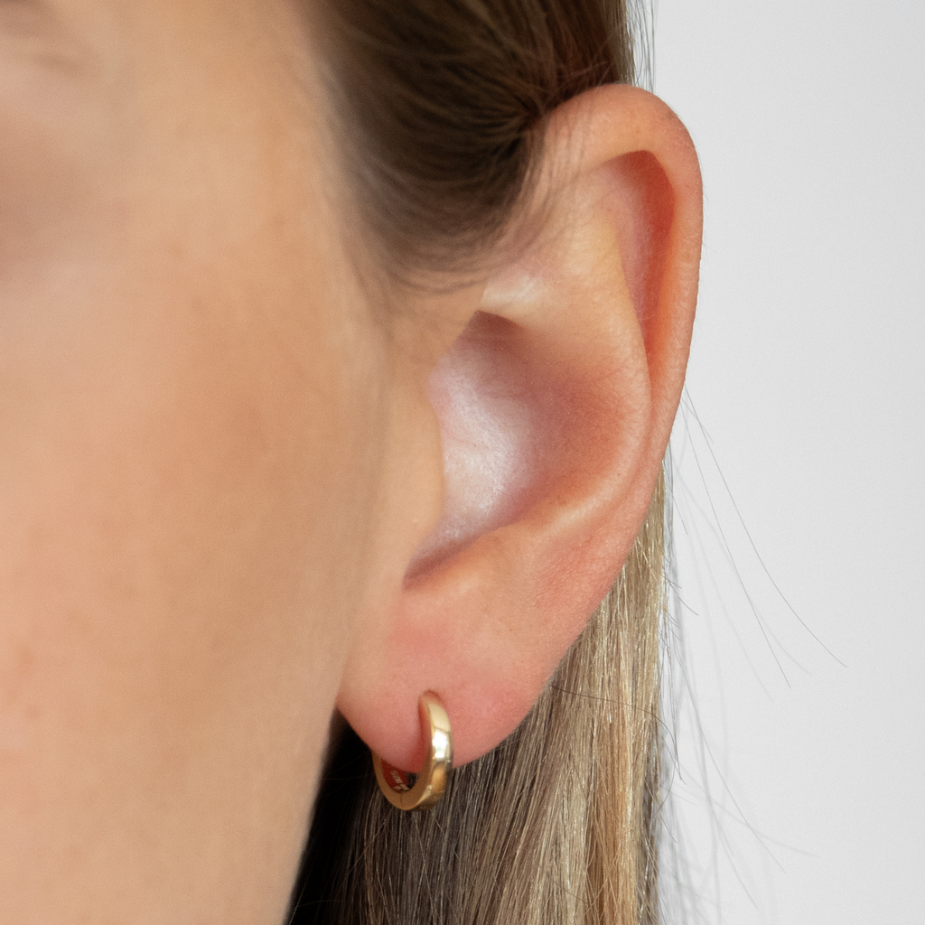 The perfect subtle, solid gold mini hoops to wear whenever and wherever!