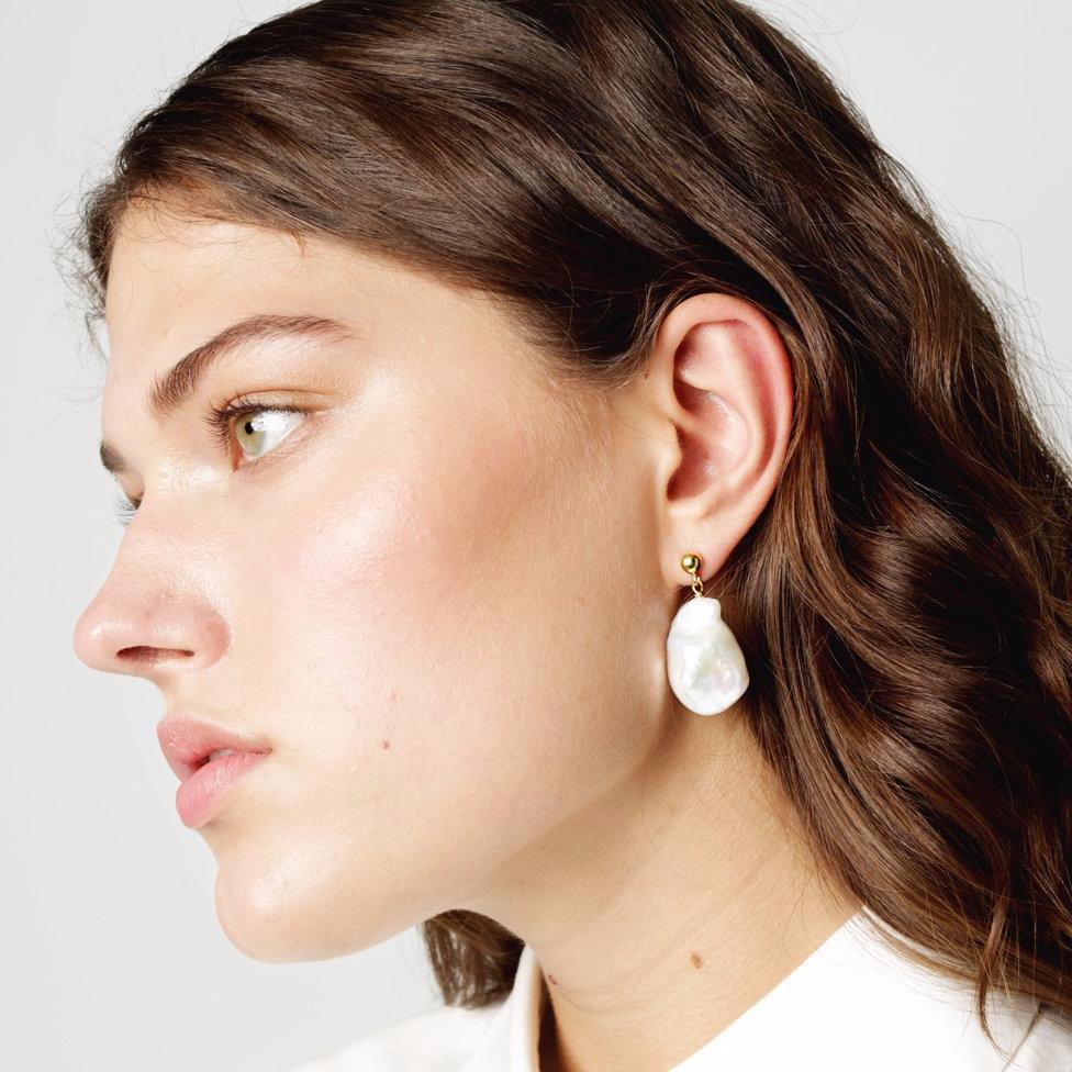 14k gold studs with big freshwater pearls | high quality pearl earrings made by a women owned brand 