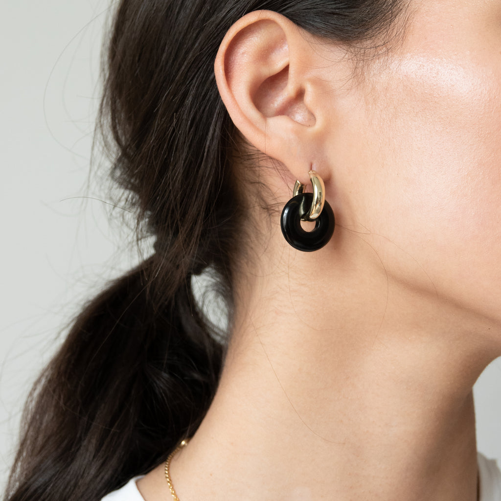 onyx black gemstone earring pendant in golden hoop from sustainable jewelry company hamburg